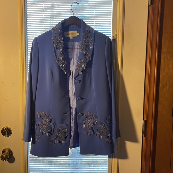 Two piece suit outfit. Size 12 with designs around collar and in front - Picture 4 of 4